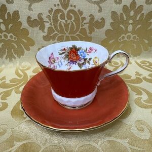 Elegant Orange Floral Teacup and Saucer Set